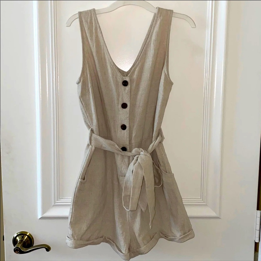 Beige shorts romper with belt included